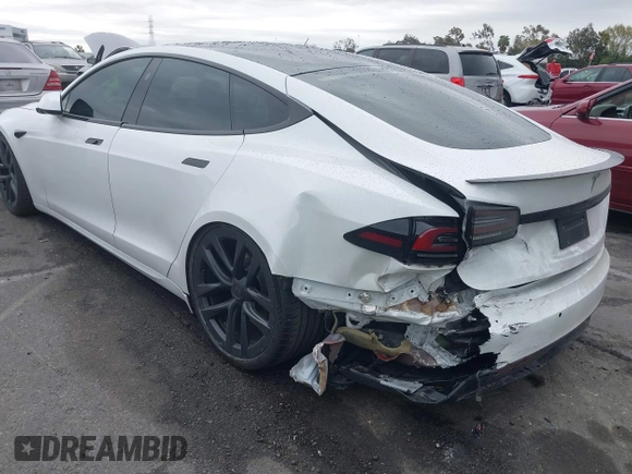 2022 Tesla Model S Plaid with VIN 5YJSA1E65NF488864, listed as a IAAI auction lot 41772788 with 33,915 mi miles and . Bid and sale history available at DreamBid. Image 3.