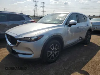 2018 Mazda CX-5 Touring z VIN JM3KFBCM1J0382064, wystawiony jako Copart lot #54347185 z przebiegiem 80 178 mil mil oraz Szkoda całkowita • Salvage title. Historia ofert i sprzedaży dostępna na DreamBid. Obrazek 1.