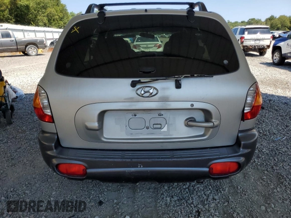 2001 Hyundai Santa Fe GLS with VIN KM8SC83D31U010136, listed as a Copart auction lot 69809604 with 79,823 mi miles and Salvage Title. Bid and sale history available at carsss.com. Image 6.