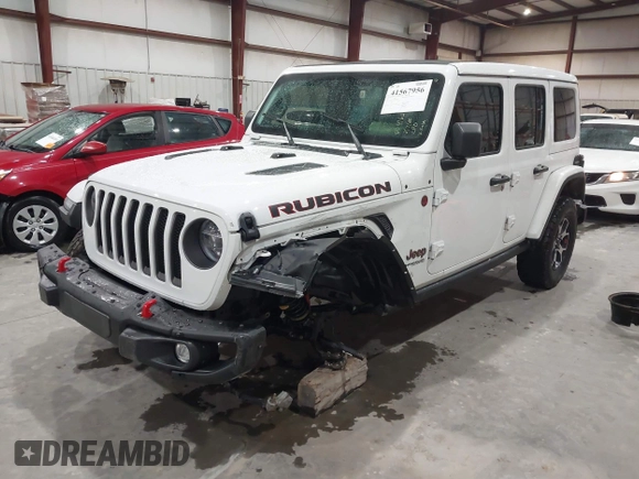 2021 Jeep Wrangler Unlimited Rubicon with VIN 1C4HJXFN2MW809904, listed as a IAAI auction lot 41567956 with 34,000 mi miles and . Bid and sale history available at DreamBid. Image 18.