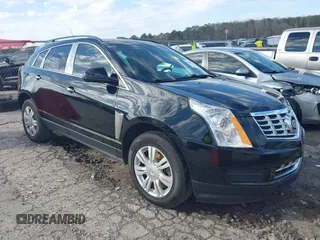 2015 Cadillac SRX with VIN 3GYFNAE38FS622913, listed as a IAAI auction lot 41590242 with 114,062 mi miles and . Bid and sale history available at carsss.com. Image 1.