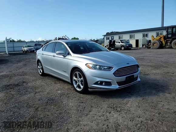 2013 Ford Fusion SE Hybrid z VIN 3FA6P0LU8DR325849, wystawiony jako Copart lot #53520515 z przebiegiem 93 615 mil mil oraz Czysty tytuł • Clean title. Historia ofert i sprzedaży dostępna na DreamBid. Obrazek 13.