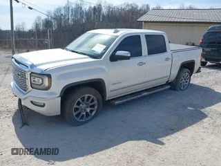 2017 GMC Sierra 1500 Denali with VIN 3GTU2PEC5HG164021, listed as a IAAI auction lot 41784101 with 69,167 mi miles and . Bid and sale history available at DreamBid. Image 2.
