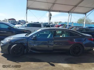 2019 Toyota Avalon Hybrid Limited with VIN 4T1B21FB9KU004539, listed as a IAAI auction lot 41784328 with 99,811 mi miles. Bid and sale history available at carsss.com. Image 14.