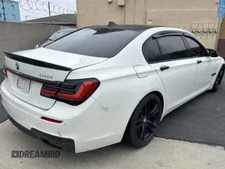 2013 BMW 7 Series 750Li xDrive with VIN WBAYF8C5XDD139832, listed as a IAAI auction lot 42487869 with 149,480 mi miles and . Bid and sale history available at DreamBid. Image 4.