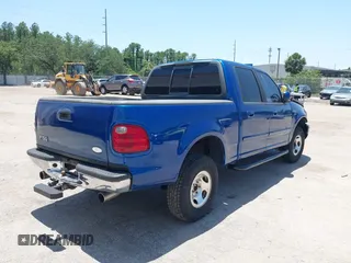 2001 Ford F-150 XLT with VIN 1FTRW07W01KE90204, listed as a IAAI auction lot 42289853 with Not provided miles and . Bid and sale history available at DreamBid. Image 4.