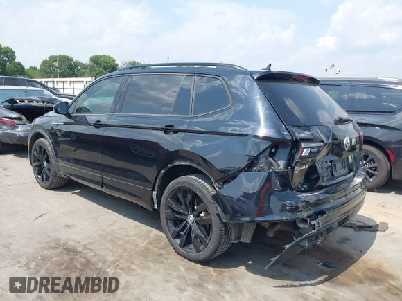 2021 Volkswagen Tiguan SE z VIN 3VV3B7AX0MM047478, wystawiony jako IAAI lot #42144239 z przebiegiem 55 468 mil mil oraz . Historia ofert i sprzedaży dostępna na DreamBid. Obrazek 3.