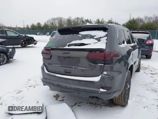 2016 Jeep Grand Cherokee High Altitude with VIN 1C4RJFCGXGC417764, listed as a IAAI auction lot 41242730 with 124,139 mi miles. Bid and sale history available at carsss.com. Image 4.