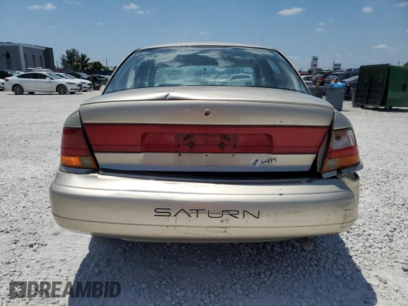 1999 Saturn SL with VIN 1G8ZK5271XZ226783, listed as a Copart auction lot 56467315 with 86,168 mi miles and Salvage title. Bid and sale history available at DreamBid. Image 6.
