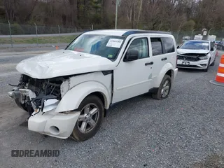 2007 Dodge Nitro SXT with VIN 1D8GU28K77W727391, listed as a IAAI auction lot 41869288 with 214,920 mi miles. Bid and sale history available at carsss.com. Image 22.