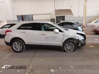 2017 Cadillac XT5 FWD with VIN 1GYKNARS7HZ121596, listed as a IAAI auction lot 41825879 with 82,023 mi miles and . Bid and sale history available at DreamBid. Image 14.