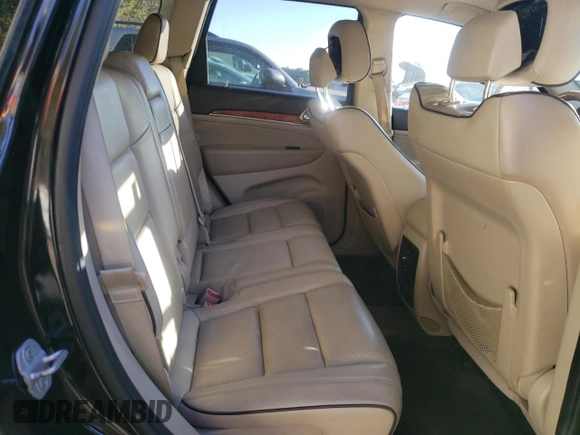 2011 Jeep Grand Cherokee Overland with VIN 1J4RS6GG7BC646610, listed as a Copart auction lot 79931614 with 188,601 mi miles and Salvage Title. Bid and sale history available at DreamBid. Image 11.
