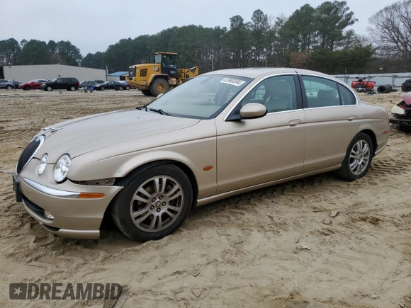 2003 Jaguar S-Type z VIN SAJEA01U33HM71782, wystawiony jako Copart lot #82969304 z przebiegiem 127 176 mil mil oraz Szkody całkowita. Historia ofert i sprzedaży dostępna na DreamBid. Obrazek 1.