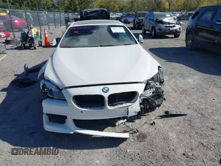 2015 BMW 6 Series 640i with VIN WBA6A0C54FGB53785, listed as a IAAI auction lot 40612020 with 67,524 mi miles and . Bid and sale history available at DreamBid. Image 12.