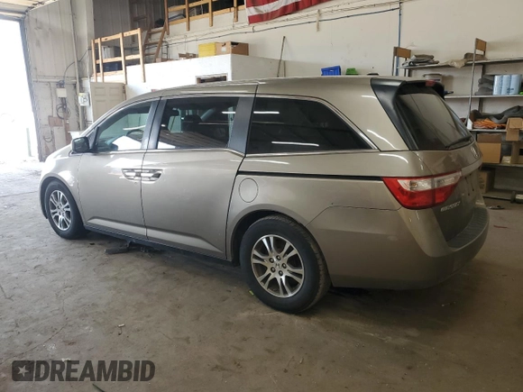 2011 Honda Odyssey EX-L with VIN 5FNRL5H63BB077325, listed as a Copart auction lot 55030675 with 203,062 mi miles and Salvage Title. Bid and sale history available at DreamBid. Image 2.