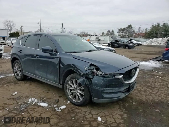 2019 Mazda CX-5 Grand Touring with VIN JM3KFBDM6K0667925, listed as a Copart auction lot 44657565 with 71,359 mi miles and Salvage Title. Bid and sale history available at carsss.com. Image 12.