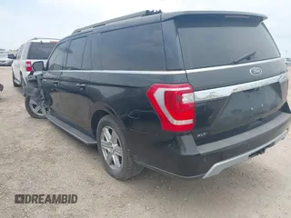 2019 Ford Expedition Max XLT with VIN 1FMJK1HTXKEA07297, listed as a IAAI auction lot 42431260 with 220,617 mi miles and . Bid and sale history available at DreamBid. Image 3.
