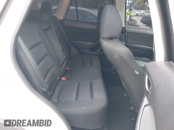 2015 Mazda CX-5 Touring with VIN JM3KE2CY8F0545967, listed as a IAAI auction lot 41909920 with 101,781 mi miles. Bid and sale history available at carsss.com. Image 8.