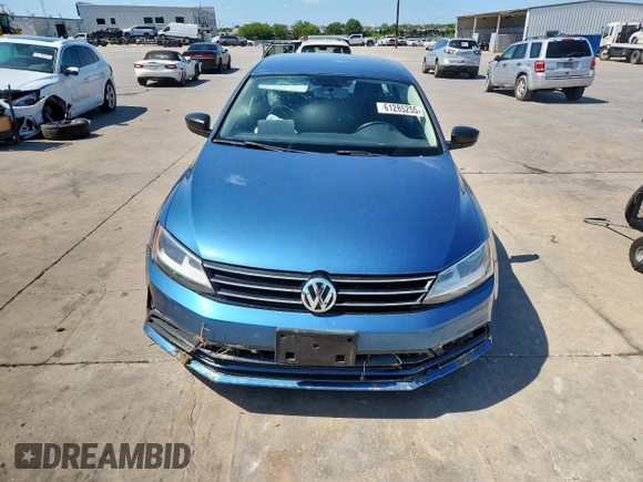 2015 Volkswagen Jetta SE with VIN 3VWD17AJ7FM272661, listed as a Copart auction lot 61285255 with 113,334 mi miles and Salvage title. Bid and sale history available at DreamBid. Image 5.