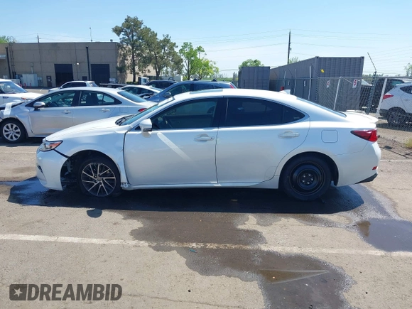 2016 Lexus ES with VIN JTHBK1GG4G2234151, listed as a IAAI auction lot 42004701 with 146,639 mi miles. Bid and sale history available at carsss.com. Image 14.
