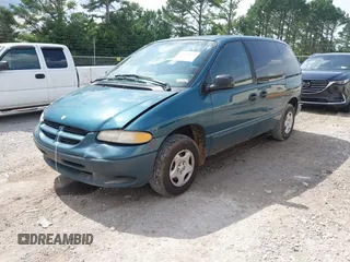 2000 Dodge Caravan with VIN 2B4FP25B8YR708751, listed as a IAAI auction lot 42471041 with 200,820 mi miles and . Bid and sale history available at DreamBid. Image 2.