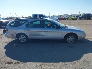 1996 Ford Taurus GL z VIN 1FALP57U9TG184497, wystawiony jako IAAI lot #42290105 z przebiegiem 149 155 mil mil oraz . Historia ofert i sprzedaży dostępna na DreamBid. Obrazek 13.
