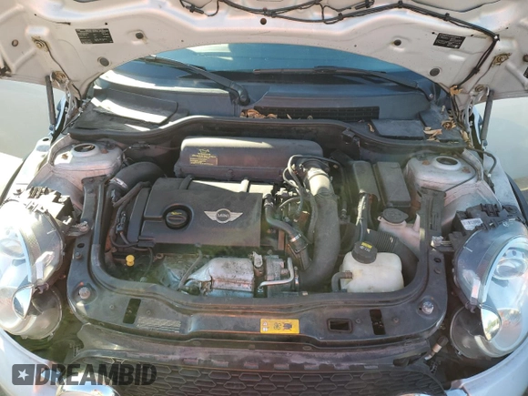 2013 MINI Convertible S with VIN WMWZP3C50DT550800, listed as a Copart auction lot 42409015 with 101,421 mi miles and Salvage title. Bid and sale history available at DreamBid. Image 11.