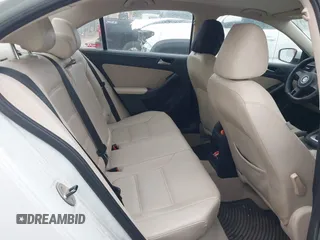 2014 Volkswagen Jetta SE with VIN 3VWD07AJ8EM296808, listed as a IAAI auction lot 41894682 with 193,898 mi miles and . Bid and sale history available at DreamBid. Image 8.
