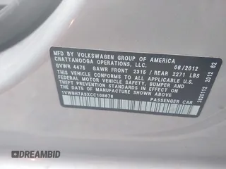 2012 Volkswagen Passat SE z VIN 1VWBH7A3XCC108676, wystawiony jako IAAI lot #41897380 z przebiegiem 94 066 mil mil oraz . Historia ofert i sprzedaży dostępna na DreamBid. Obrazek 9.