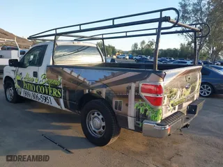 2014 Ford F-150 XL with VIN 1FTNF1CF1EKD83954, listed as a IAAI auction lot 41620910 with 165,042 mi miles. Bid and sale history available at carsss.com. Image 3.