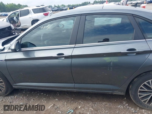 2019 Volkswagen Jetta SEL z VIN 3VWE57BU6KM009492, wystawiony jako IAAI lot #42104094 z przebiegiem 137 087 mil mil oraz . Historia ofert i sprzedaży dostępna na DreamBid. Obrazek 14.