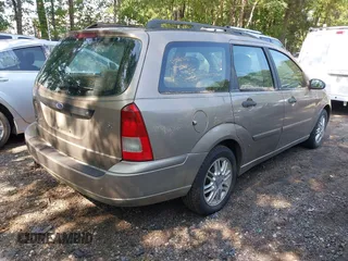 2004 Ford Focus SE z VIN 1FAFP36324W186481, wystawiony jako IAAI lot #42654016 z przebiegiem 168 331 mil mil oraz . Historia ofert i sprzedaży dostępna na DreamBid. Obrazek 4.