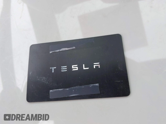 2022 Tesla Model S Plaid with VIN 5YJSA1E64NF479959, listed as a IAAI auction lot 41057673 with 27,203 mi miles and . Bid and sale history available at DreamBid. Image 9.