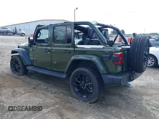 2023 Jeep Wrangler Sahara with VIN 1C4JJXP60PW556336, listed as a IAAI auction lot 39553199 with 10,437 mi miles and . Bid and sale history available at DreamBid. Image 3.