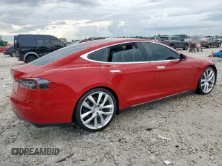 2014 Tesla Model S 60 with VIN 5YJSA1H11EFP43669, listed as a Copart auction lot 62368605 with Not provided miles and Salvage title. Bid and sale history available at DreamBid. Image 3.