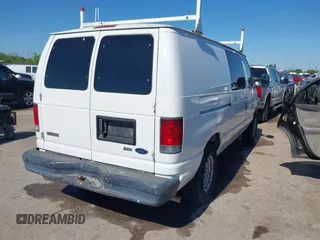 2009 Ford Econoline Cargo Commercial with VIN 1FTNE14W69DA46482, listed as a IAAI auction lot 42235430 with 339,835 mi miles and . Bid and sale history available at DreamBid. Image 4.