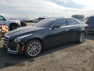2014 Cadillac CTS Luxury AWD with VIN 1G6AX5SX8E0197081, listed as a Copart auction lot 47273315 with 133,577 mi miles and Clean Title. Bid and sale history available at DreamBid. Image 1.