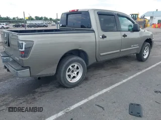 2006 Nissan Titan LE with VIN 1N6BA07A66N561963, listed as a IAAI auction lot 42131877 with 175,293 mi miles and . Bid and sale history available at DreamBid. Image 4.