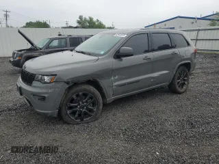 2020 Jeep Grand Cherokee Laredo E with VIN 1C4RJFAG7LC104250, listed as a Copart auction lot 62643375 with 118,118 mi miles and Salvage title. Bid and sale history available at DreamBid. Image 1.
