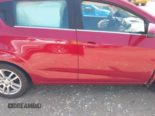 2012 Chevrolet Sonic LT with VIN 1G1JC6SH7C4135418, listed as a IAAI auction lot 42464564 with 169,035 mi miles and . Bid and sale history available at DreamBid. Image 14.
