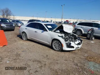 2016 Cadillac CTS Luxury Collection AWD with VIN 1G6AX5SX8G0114543, listed as a IAAI auction lot 41398389 with 114,336 mi miles and . Bid and sale history available at DreamBid. Image 1.
