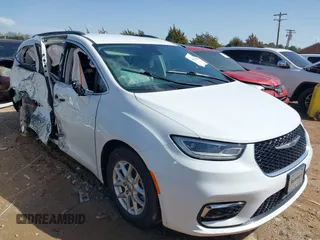 2022 Chrysler Pacifica Touring L with VIN 2C4RC1BGXNR132615, listed as a IAAI auction lot 41643983 with 45,717 mi miles and . Bid and sale history available at DreamBid. Image 1.