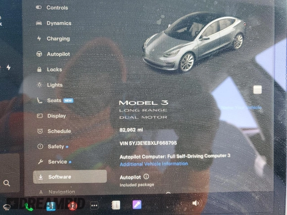 2020 Tesla Model 3 Long Range with VIN 5YJ3E1EBXLF668795, listed as a Copart auction lot 49913515 with 82,962 mi miles and Salvage Title. Bid and sale history available at DreamBid. Image 9.