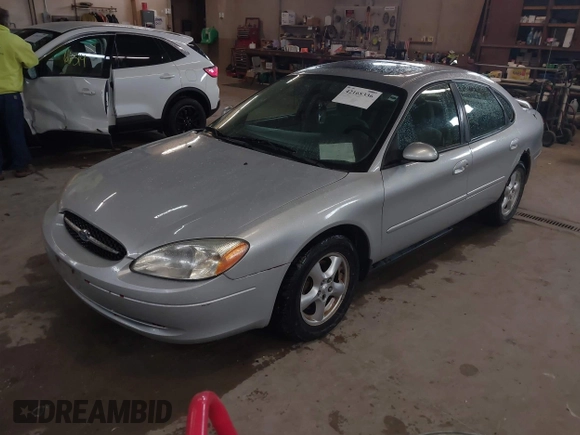 2003 Ford Taurus SES Standard with VIN 1FAFP55U13G222465, listed as a IAAI auction lot 42168336 with 128,078 mi miles. Bid and sale history available at carsss.com. Image 2.