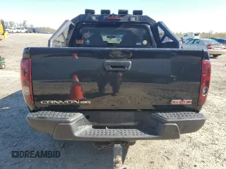 2005 GMC Canyon 1SF SLE Z71 z VIN 1GTDT136458227828, wystawiony jako Copart lot #51713055 z przebiegiem 79 594 mil mil oraz Czysty tytuł • Clean title. Historia ofert i sprzedaży dostępna na DreamBid. Obrazek 6.
