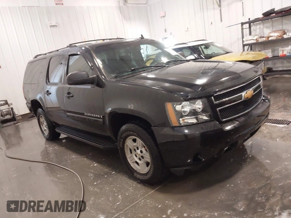 2007 Chevrolet Suburban LTZ with VIN 1GNFK16367R231896, listed as a IAAI auction lot 41979944 with 202,137 mi miles. Bid and sale history available at carsss.com. Image 1.