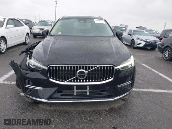 2023 Volvo XC60 Recharge Plug-In Hybrid Ultimate Bright Theme with VIN YV4H60DA8P1336663, listed as a IAAI auction lot 41692103 with 19,028 mi miles. Bid and sale history available at carsss.com. Image 12.