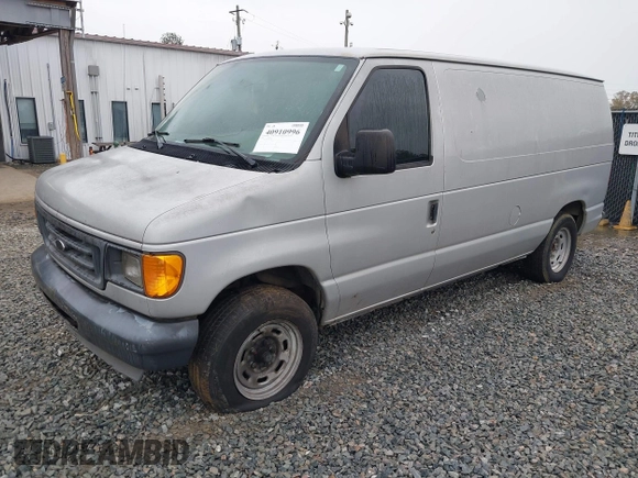 2005 Ford Econoline Cargo with VIN 1FTRE14W85HA67080, listed as a IAAI auction lot 40910996 with 599,247 mi miles. Bid and sale history available at carsss.com. Image 2.
