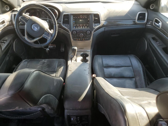 2017 Jeep Grand Cherokee Overland with VIN 1C4RJECG2HC614746, listed as a Copart auction lot 77362304 with 86,330 mi miles and Salvage Title. Bid and sale history available at carsss.com. Image 8.