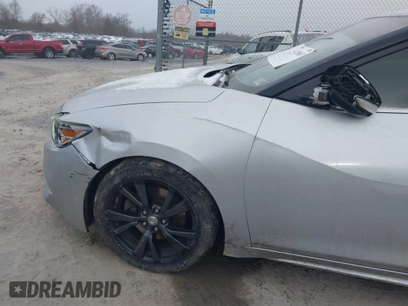 2018 Nissan Maxima SV with VIN 1N4AA6AP7JC380038, listed as a IAAI auction lot 41228603 with 135,067 mi miles and . Bid and sale history available at DreamBid. Image 6.